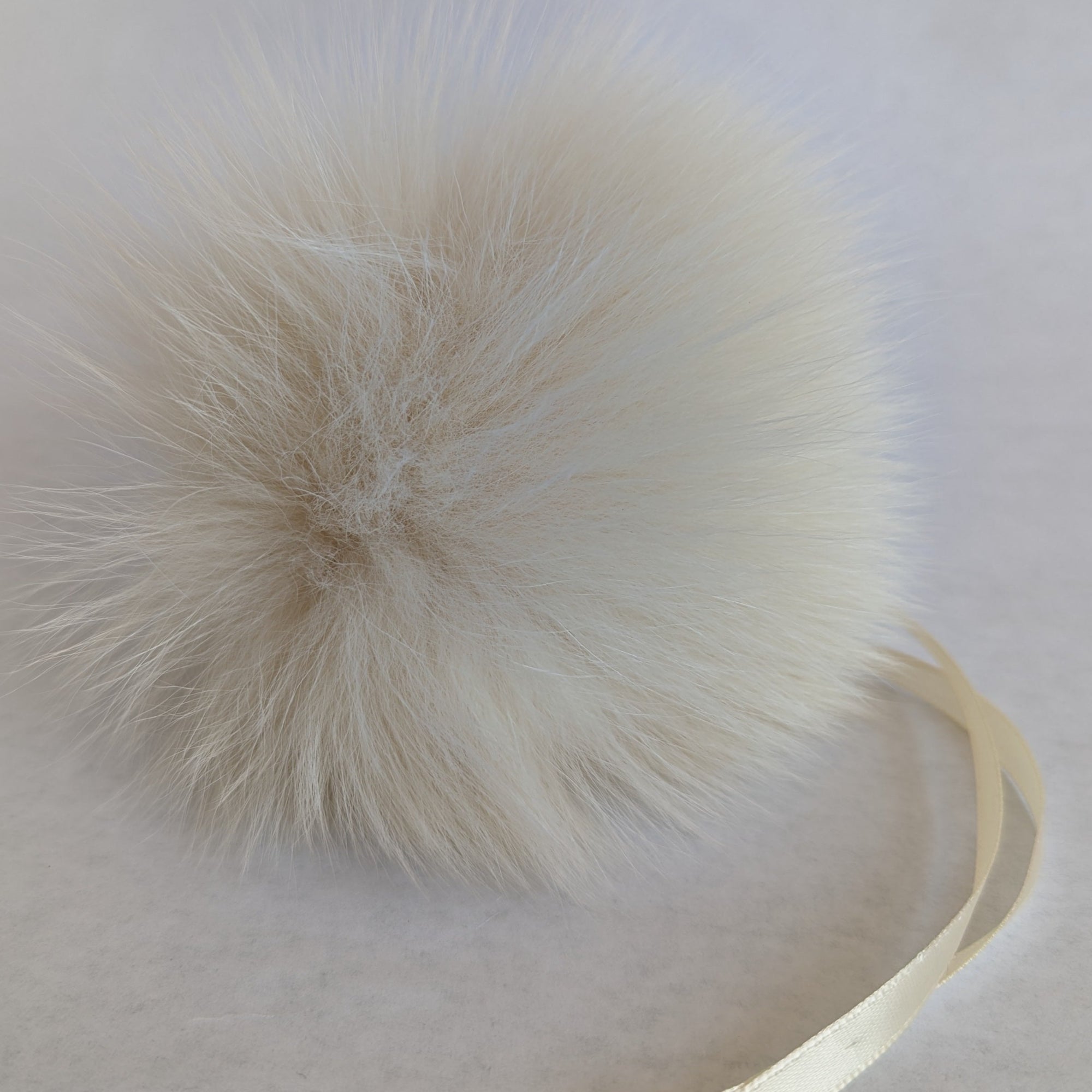 fox fur pom cream