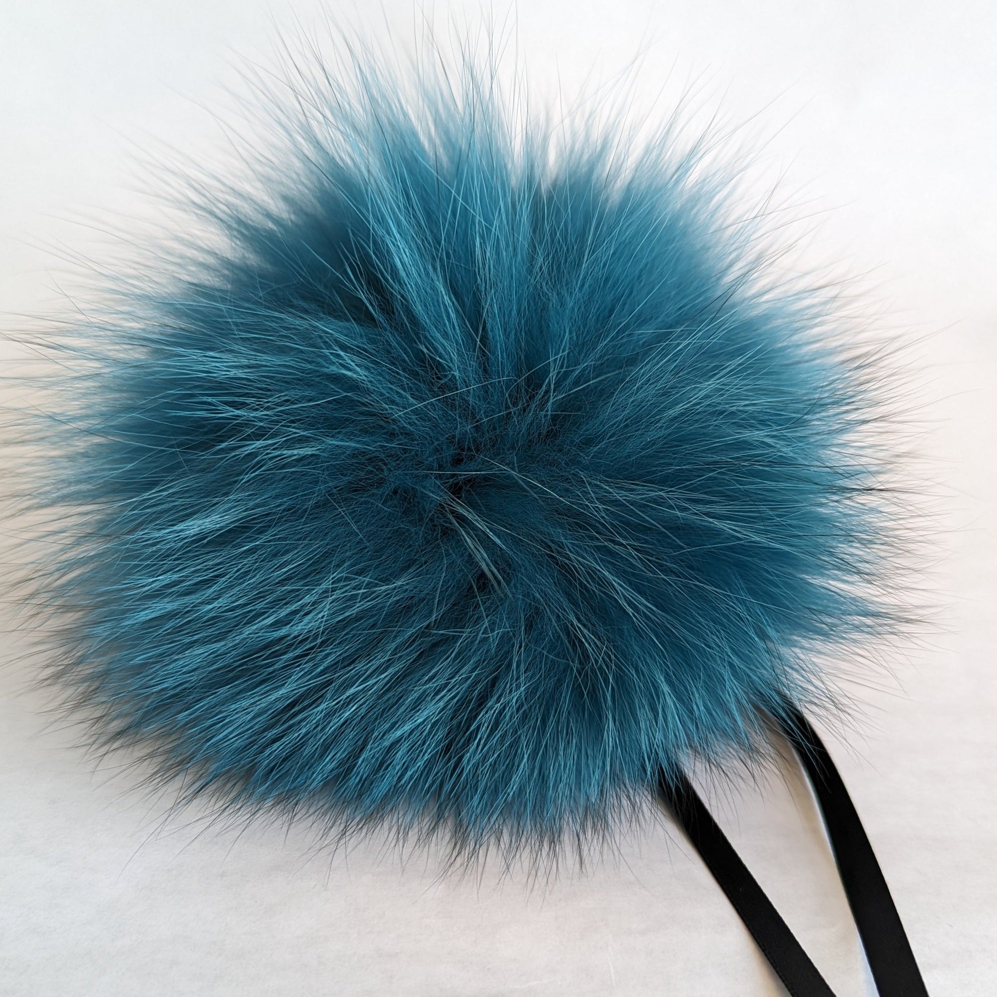 fox fur pom teal